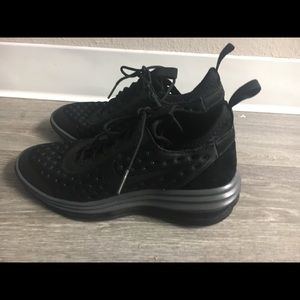 Nike Lunar Elite Wedge sneakers.